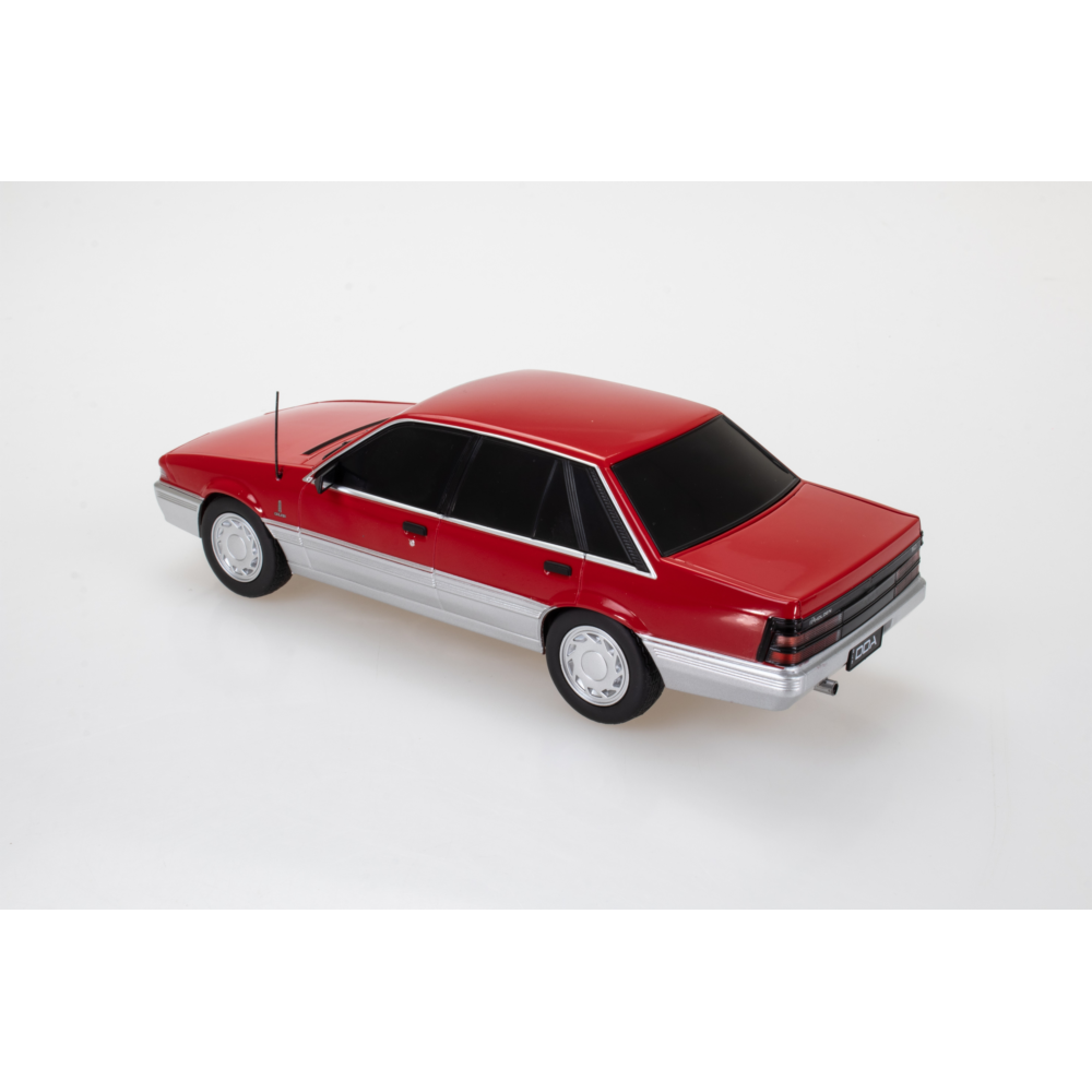 Holden VL Calais Spectra Rides Red Plastic Light Up Diecast Model Car 1:24 Scale (Approx. 18–20cm) Collectible | Universal Auto Spares