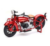 1930s vintage touring motorcycle diecast model, burgundy red color, inline engine, sweeping fenders, spoked wheels, tan leather-style seat, classic pre-war design