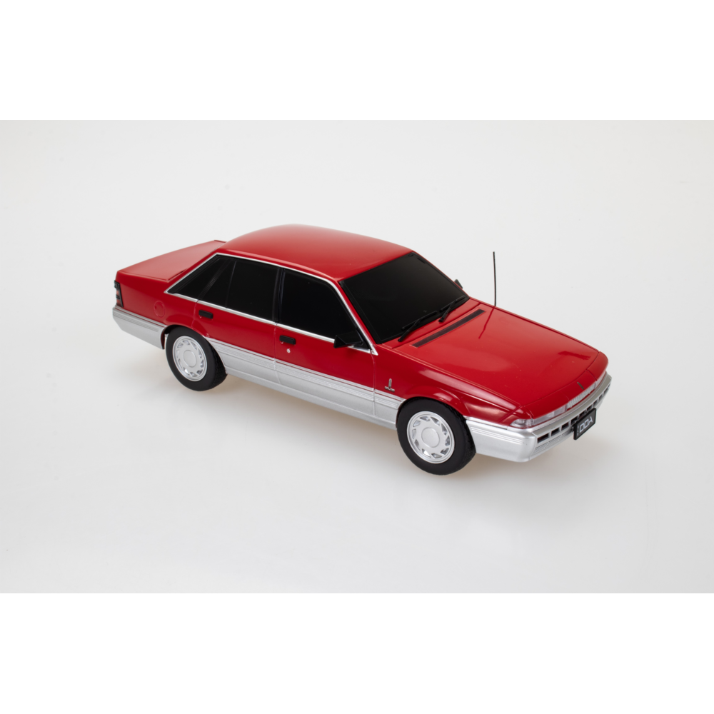 Holden VL Calais Spectra Rides Red Plastic Light Up Diecast Model Car 1:24 Scale (Approx. 18–20cm) Collectible | Universal Auto Spares