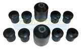 Set of black rubber bushings on a white background