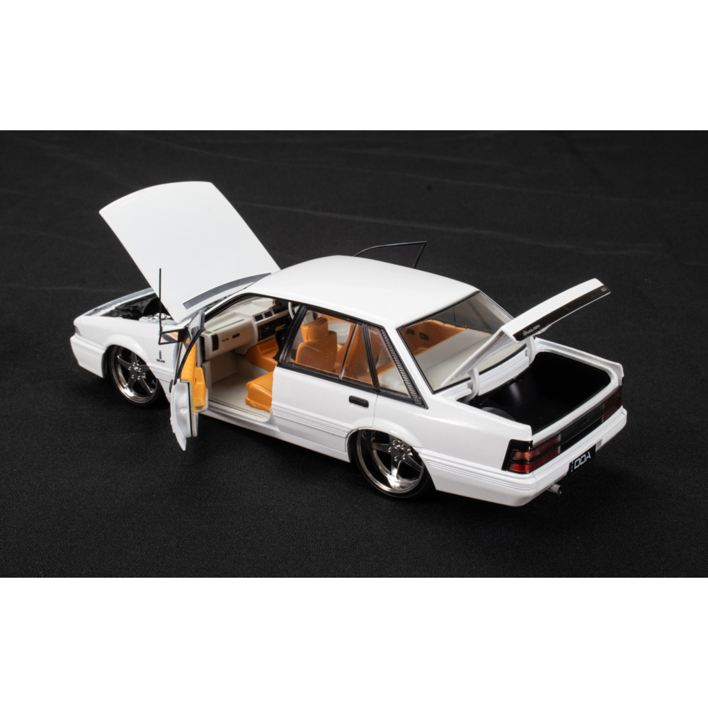 Metallic White Holden VL Calais Custom diecast with open bonnet, front door and boot